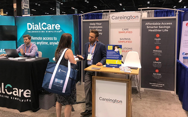DialCare and Careington networking at a conference